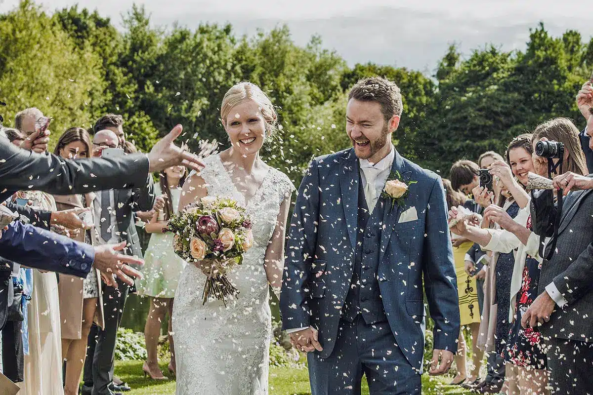 Wedding couple showered with confetti - The Village Florist Hunters Hill