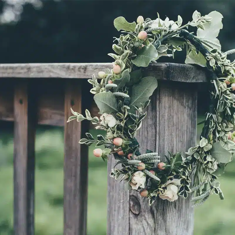 Floral wreath on wooden post - The Village Florist Hunters Hill