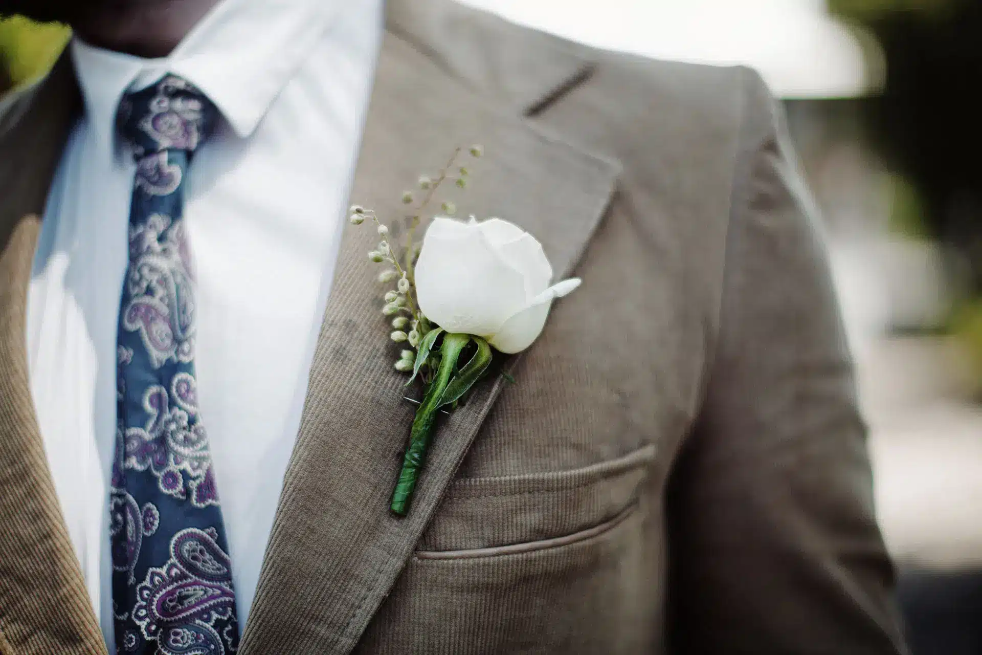 Groom in suit with white rose boutonniere - The Village Florist Hunters Hill