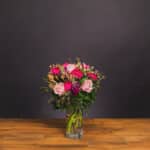 Bright Delight floral arrangement with pink and red roses. - The Village Florist Hunters Hill
