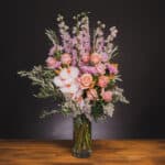 Pastel flower arrangement with pink roses and orchids. - The Village Florist Hunters Hill