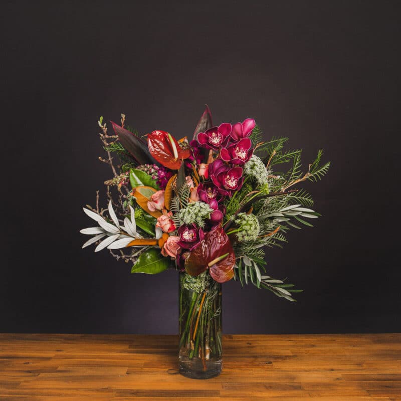 Modern floral arrangement with orchids and anthuriums. - The Village Florist Hunters Hill