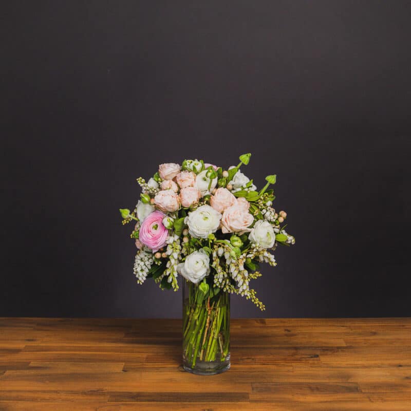 Pink and white ranunculus flower arrangement in a glass vase. - The Village Florist Hunters Hill