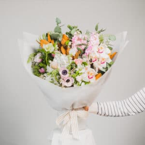 Pale pink and white orchid and anemone flower arrangement. - The Village Florist Hunters Hill