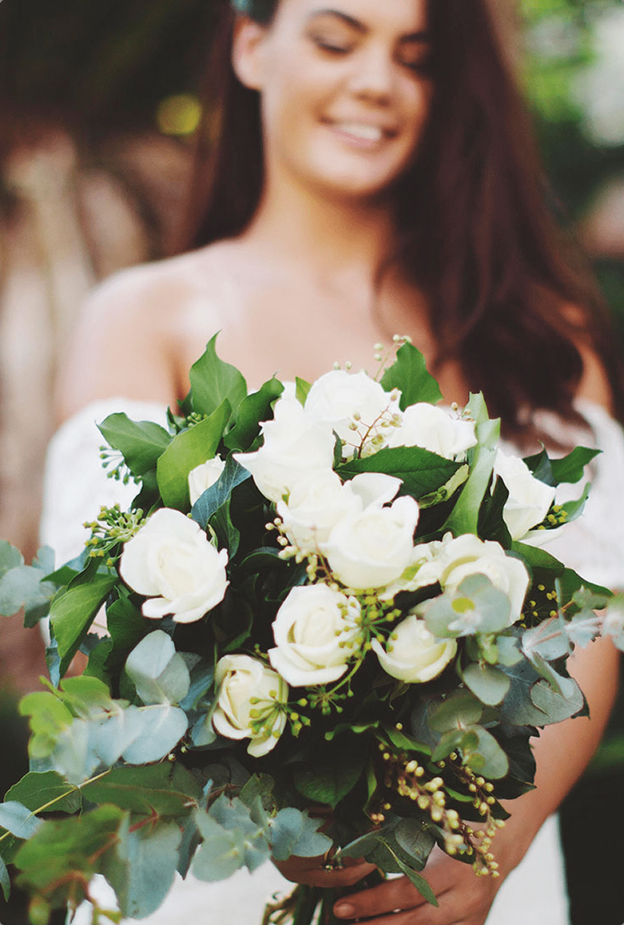 Bride holding white rose wedding bouquet - The Village Florist Hunters Hill