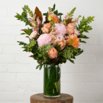 Peach and pink floral arrangement in vase - The Village Florist Hunters Hill