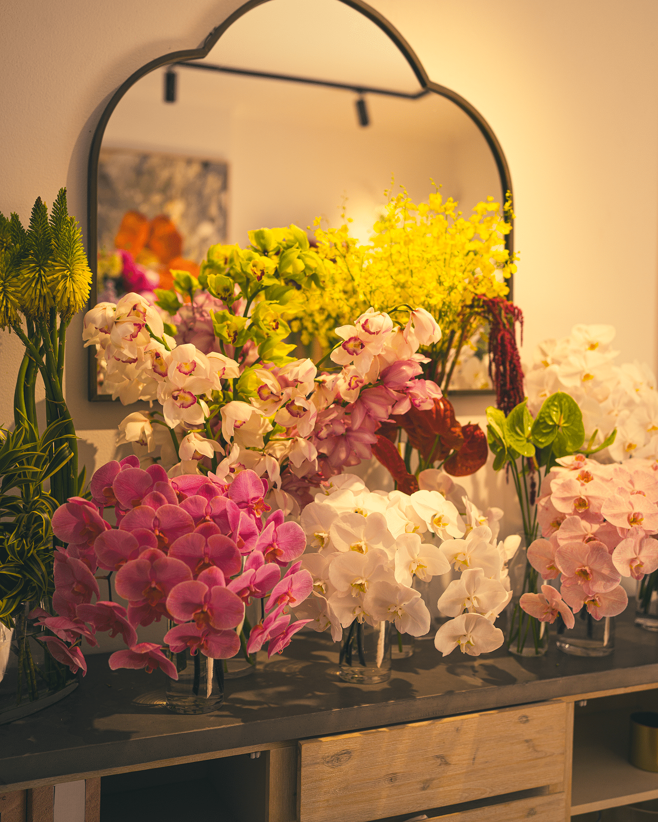 Orchid arrangements with mirror reflection - The Village Florist Hunters Hill