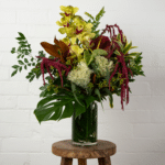 Vibrant floral arrangement with orchids and amaranthus - The Village Florist Hunters Hill